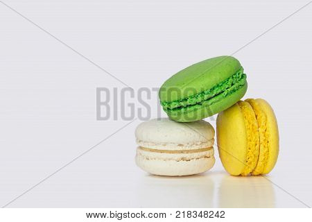 French Colorful Macarons on a White Background