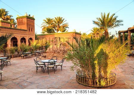 M'hamid Morocco - February 22 2016: Chez le Pacha hotel inside view of the patio and typical arabic inside garden to relax