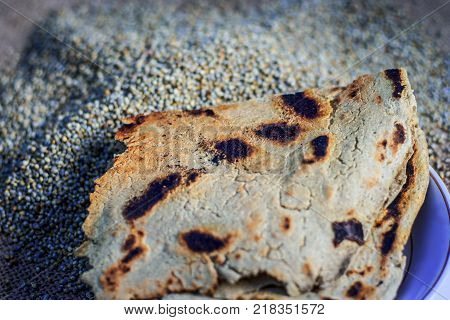 Roti/chapati Of Pearl Millet/bajra/pennisetum Glaucum With Whole Grains Of Pearl Millet.