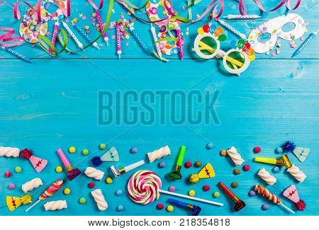 Colorful Party Accessories On Wooden Background, Top Niew, Copy Space