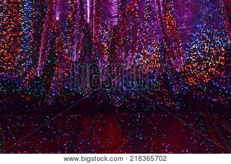 multicolored shimmering, dark, crimson red rainbow background