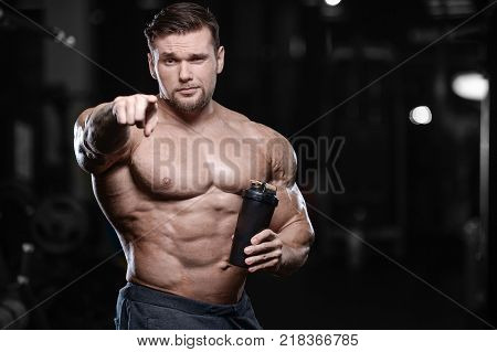 Brutal sexy strong bodybuilder athletic fitness man pumping up abs muscles workout bodybuilding concept background - muscular handsome men doing health care fitness exercises in gym naked torso
