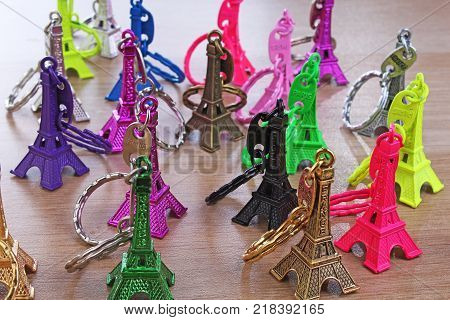 Eiffel tower statue. Paris tourism illustration. Beautiful metallic plastic souvenir statue. Colorful illustration of french tourism or any other concept. Souvenirs.