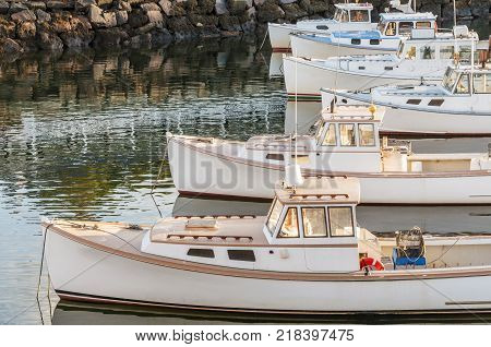 Series of fishing boats on Maine coast in Ogunquit