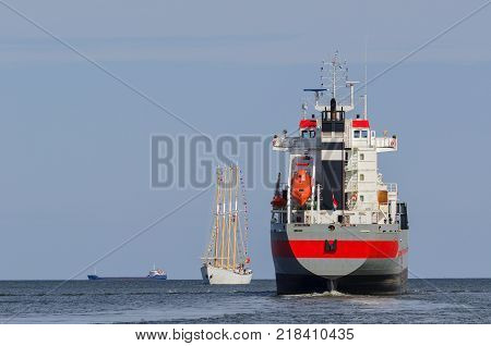 SAILING VESSEL AND FREIGHTERS - Ships in the cruise on the sea