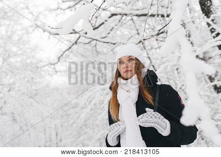Beautiful Young Girl In A White Winter Forest
