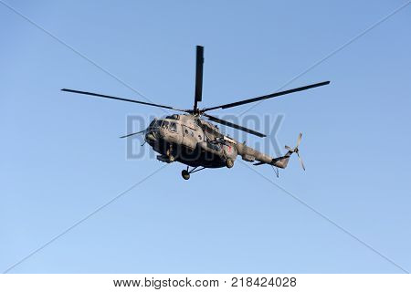 Koktebel, Crymea, Russia - September 28, 2016 Soviet Russian multipurpose helicopter, Mi-8mt during the flight over the beach of the resort village of Koktebel
