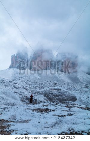 Tre Cime di Lavaredo in beautiful surroundings in the Dolomites at foggy winter weather in Italy Europe (Drei Zinnen)