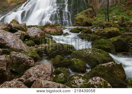 Beautiful Golling waterfall and near Golling and Salzach medieval town at autumn in Austria