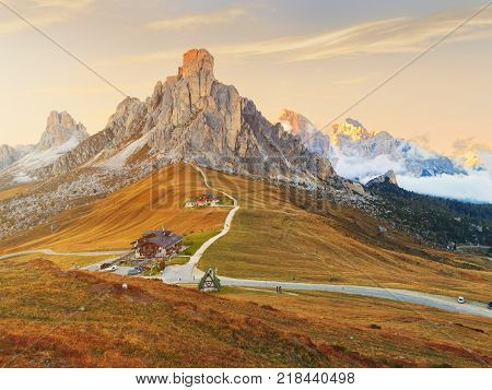 Dolomites mountains the Passo di Giau Monte Gusela at behind Nuvolau gruppe at sunset in South Tyrol Italy