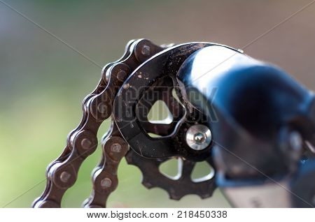 Broken bicycle chain close up in natural light