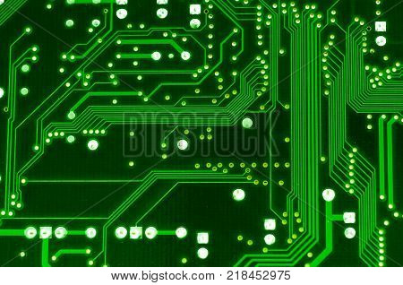 Green computer circuit board close up shot