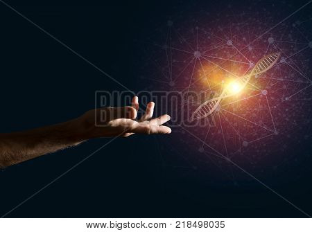 Close of man hand presenting DNA molecule research as concept. Mixed media