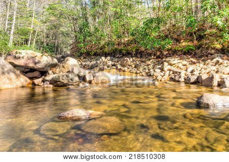 Williams River In Autumn With Stones, Bridge And Highland Scenic Highway Road In West Virginia Monon
