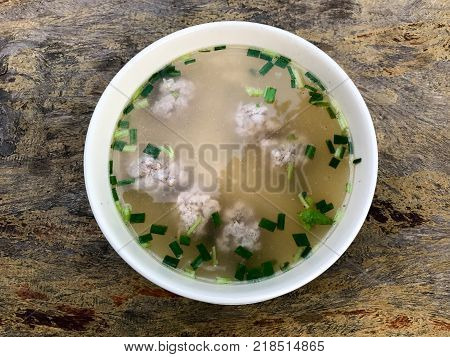 Congee pork with vegetable in bowl at the hotel