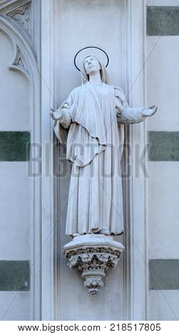ROME, ITALY - SEPTEMBER 02: Statue of St. Margaret Mary Alacoque on the facade of Sacro Cuore del Suffragio church in Rome, Italy  on September 02, 2016.