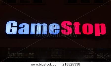 GIESSEN GERMANY DECEMBER 2017: Illuminated Logotype of GAME STOP. GAME STOP is a virtual game store chain based in Memmingen Bayern.