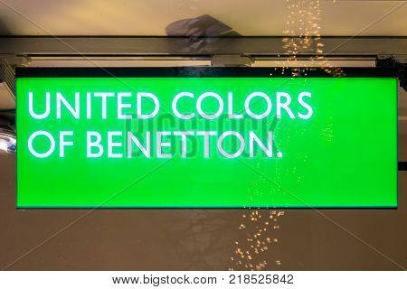GIESSEN GERMANY DECEMBER 2017: Illuminated Logotype of UNITED COLORS OF BENETTON. UNITED COLORS OF BENETTON is a international company saling outwear.
