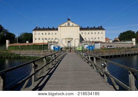 Kalmar Sweden - August 22 2017: Exterior of the prison with central location in Kalmar at the end of the bridge over the water.