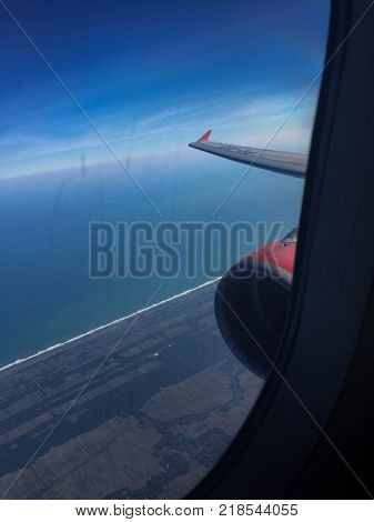 Beautiful view out of an airplane window somewhere above Yogyakarta