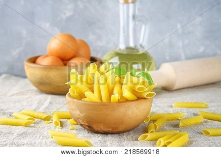 Penne rigate. Macaroni in the form of feathers. mostaccioli pasta