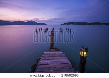 Beautiful view of sunset at Lumut,Perak,Malaysia. soft focus, blur due to long exposure. Visible noise due to high ISO.