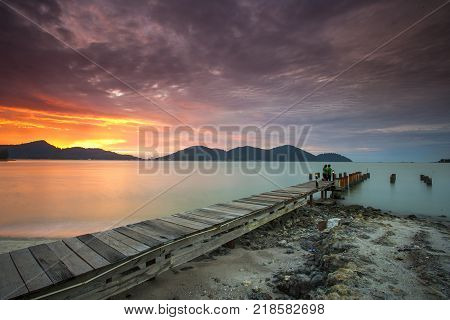 Beautiful view of sunset at Lumut,Perak,Malaysia. soft focus, blur due to long exposure. Visible noise due to high ISO.