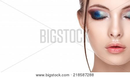 Close up half face portrait of girl with perfect fresh clean skin young model with beautiful glamorous makeup wet effect on her face and body eyes closed copy space your text here front view