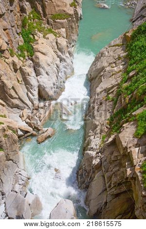 Reuss river in the swiss alps, Devil's bridge nearby Andermatt city, Switzerland
