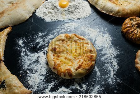 imeretian khachapuri is national Georgian cuisine dish. Baked bread with cheese filling. Delicious pastry snack
