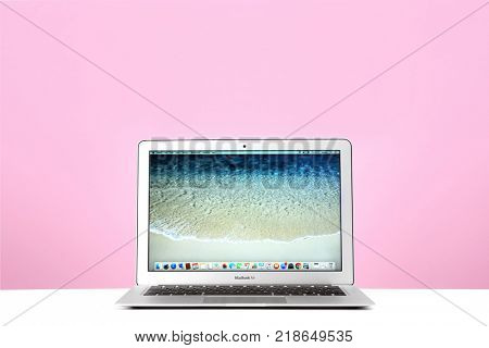 KYIV, UKRAINE - OCTOBER 26, 2017: Apple MacBook Air with desktop screensaver