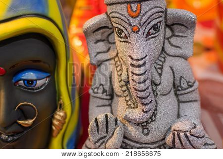 Colorful dolls made of clay Lord Ganesha handicrafts on display during the Handicraft Fair in Kolkata earlier Calcutta West Bengal India. It is the biggest handicrafts fair in Asia.
