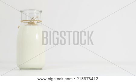 milk, kefir, greek yogurt bottle on white background. Fresh and fermented dairy products. Copy space concept