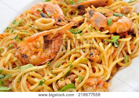 Pastas with shrimps squids and tomato sauce