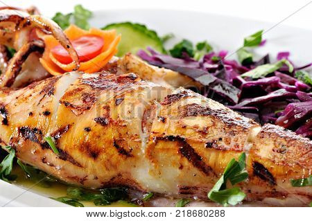Grilled Greek Calamari with vegetables and tomatoes