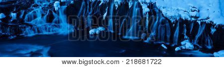 Hraunfossar waterfalls shot on long exposure in detail, Iceland