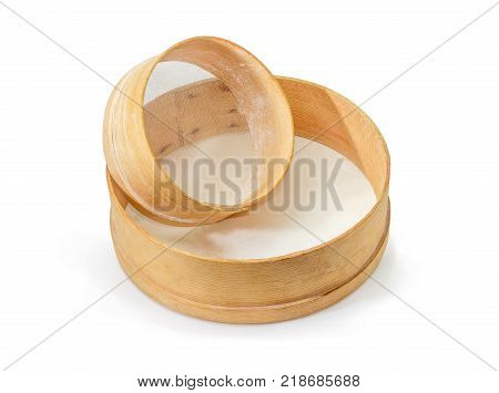 Two old round kitchen sieves different sizes with wooden frames and plastic mesh on a white background