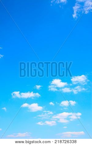 Blue sky with clouds - vertical background, copyspace composition, space for text