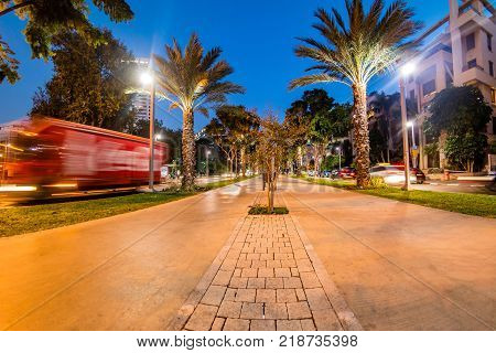 Boulevard Rothschild illuminated in the evening, Tel Aviv, Israel.