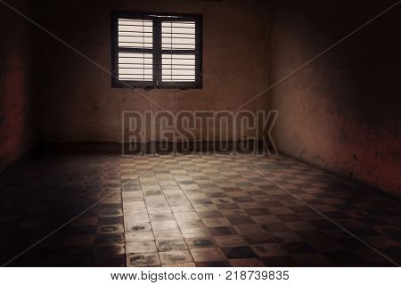 Phnom Penh, Cambodia - April 1, 2017: Tuol Sleng Genocide Museum in Phnom Penh, Cambodia. Emty room used as prison.
