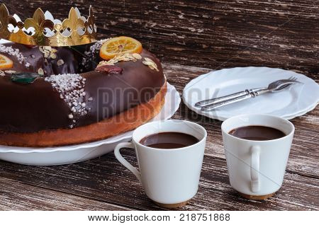 Roscon de reyes chocolate spanish desert to celebrate Epiphany or Dia de Reyes Magos Three Wise Men Day.