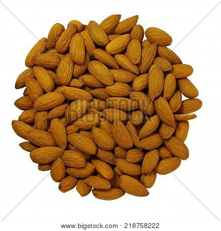 Almond. A lot of nuts. Brown color. Nut dust. Without a shell. Appetizing. White isolated color.