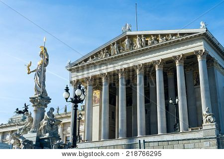 Austrian parliament building with Athena statue on the front in Vienna