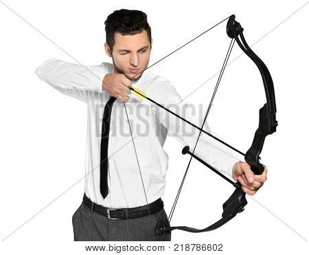 Young businessman practicing archery on white background