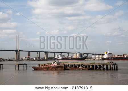 QEII Bridge over the River Thames with barges