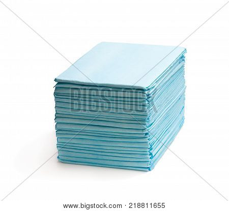 Stack Of Disposable Bed Pads Isolated On White