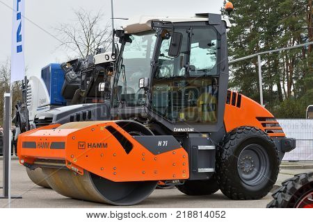 VILNIUS LITHUANIA - APRIL 27: Hamm Road roller on April 27 2017 in Vilnius Lithuania. Hamm AG is a German worldwide manufacturer and marketer of road rollers.