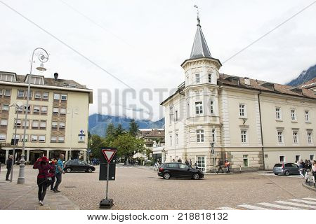 Italian people and foreigner travelers walking travel and visit shopping in downtown with retro classic building at Meran city on September 2 2017 in Merano Italy