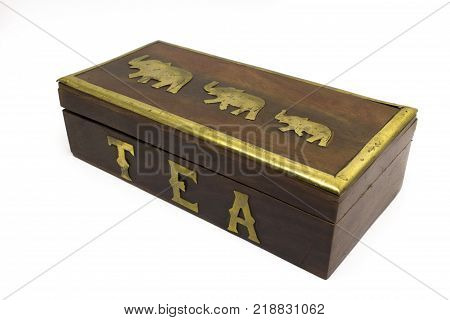 Wooden asian tea box with gold elephants isolated on white