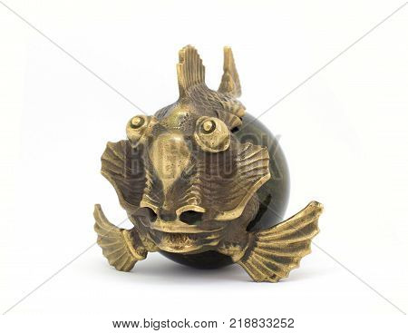 Bronze stone miniature antique fish isolated on white background